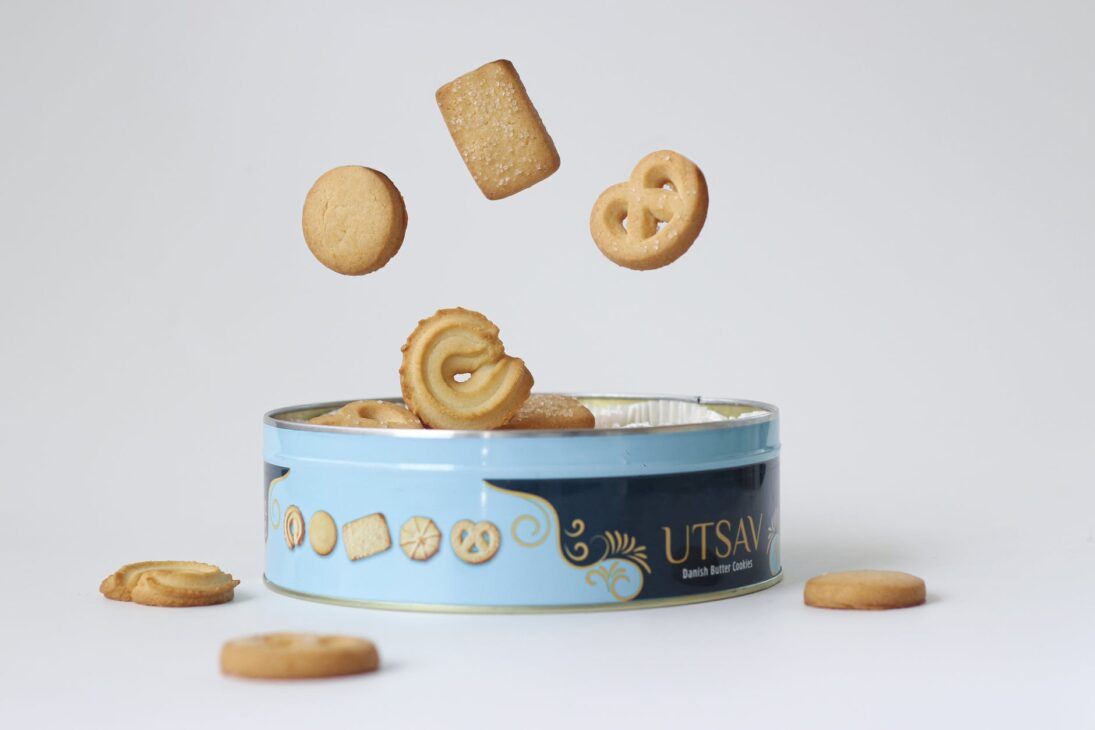 a product photography of a box of danish butter cookies